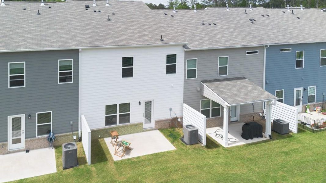 Exterior details and patio area of a home in Ellison Square, Sugar Hill (Image 3).