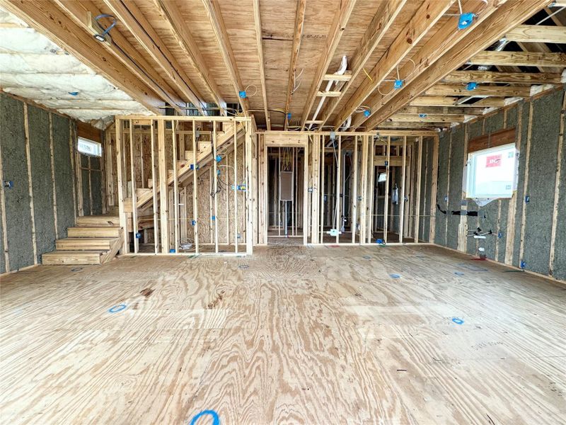 View walking into the front door. Kitchen on right, living room on left.