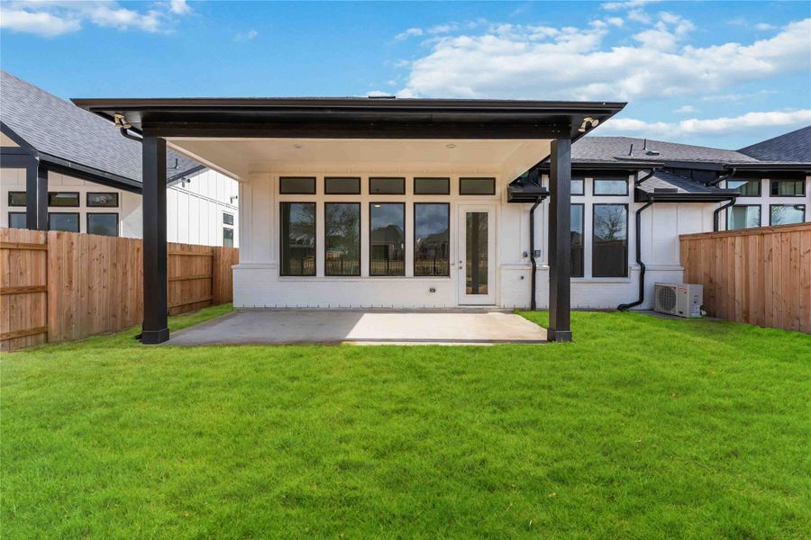 Exterior details and patio area of a home in Elyson, Katy (Image 3). Exterior details and patio area of a home in Elyson, Katy (Image 3).