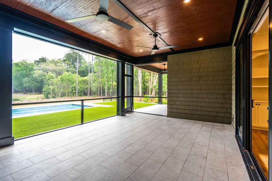 Exterior details and patio area of a home in , Johns Island (Image 46).
