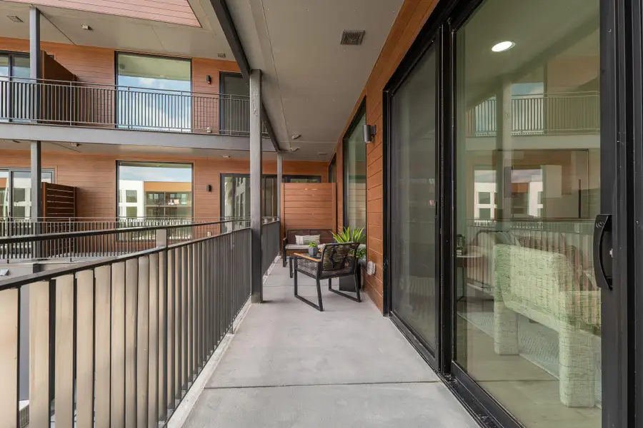 Exterior details and patio area of a home in One Oak, Austin (Image 2).