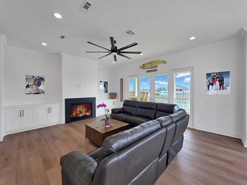 View of living room, which now has a TV in place