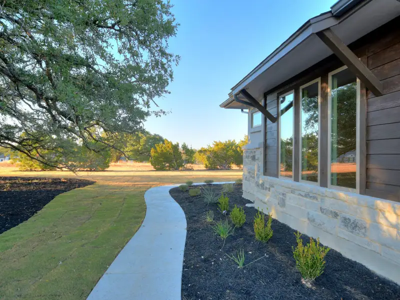 Representative exterior details of a home built from the Santa Barbara II by Giddens Homes in Scofield Farms Estates, Georgetown (Image 35).