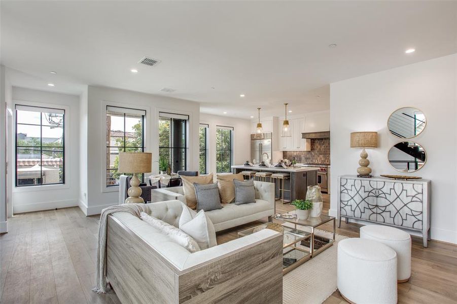 Living room with light wood flooring