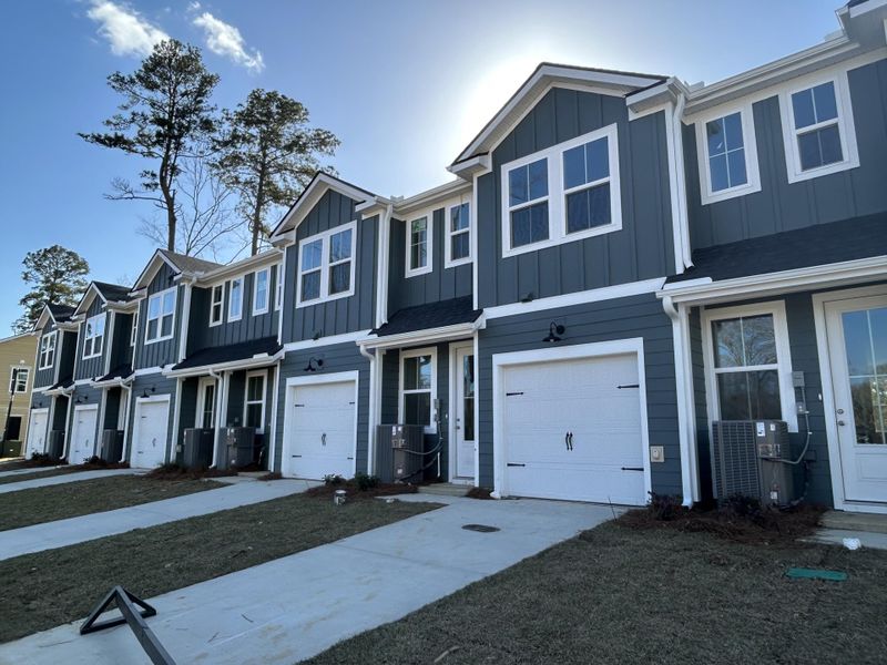 Front exterior of a new home in , Summerville, SC, highlighting curb appeal (Image 17).