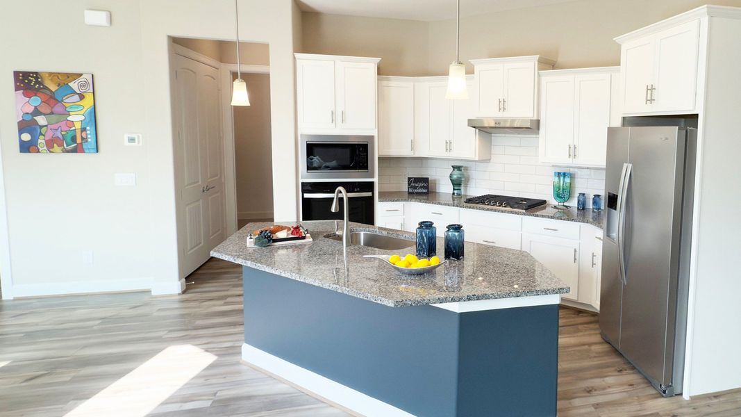 Representative furnished interior of a home built from the Portico by Epcon Communities in Winfrey Estates, Tomball (Image 12). Representative furnished interior of a home built from the Portico by Epcon Communities in Winfrey Estates, Tomball (Image 12).