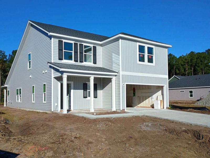 Exterior details and patio area of a home in Trieste at Bella Vita, Myrtle Beach (Image 2). Exterior details and patio area of a home in Trieste at Bella Vita, Myrtle Beach (Image 2).