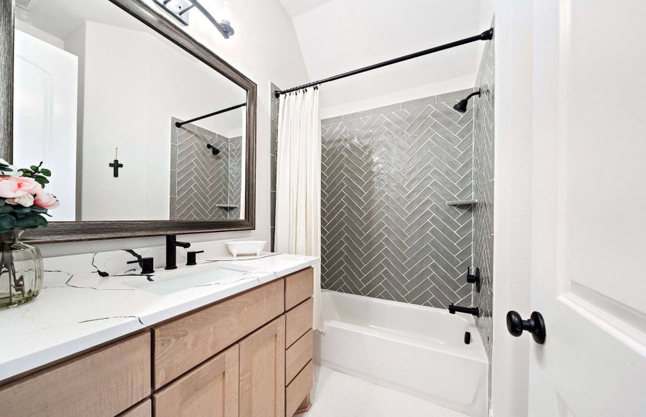 Representative furnished interior of a home built from the 3546 by Ravenna Homes in The Woodlands Hills 65′, Willis (Image 47).