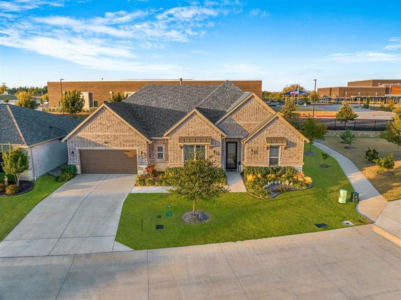 Front exterior of a new home in Ladera Prosper, Prosper, TX, highlighting curb appeal (Image 24).