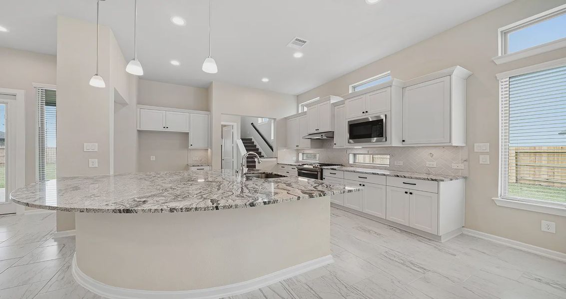 Representative furnished interior of a home built from the Oliver by Chesmar Homes in The Highlands, Porter (Image 5).
