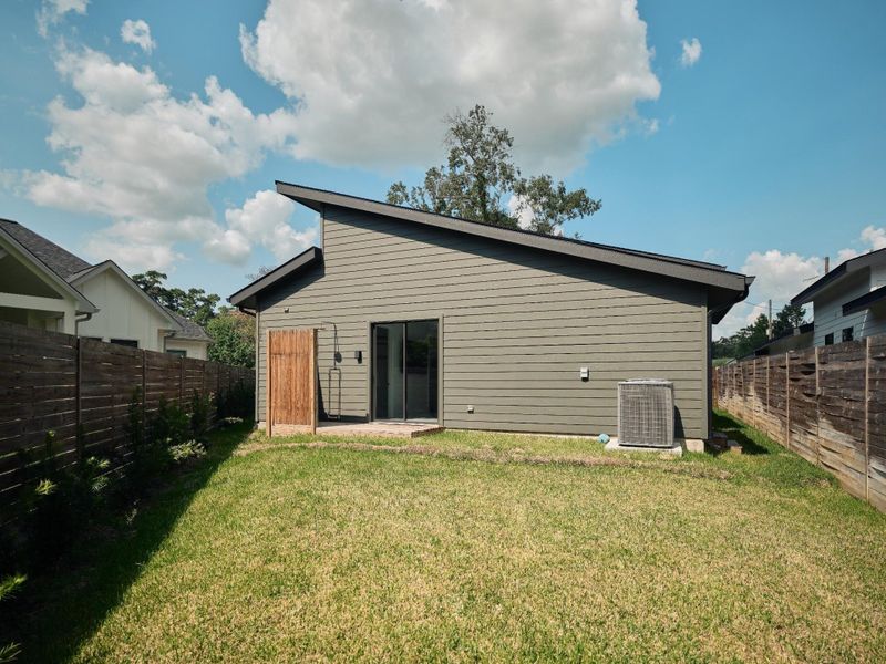 Exterior details and patio area of a home in , Conroe (Image 21).