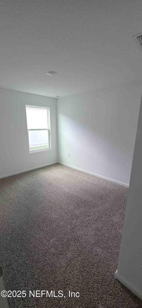 Spacious, unfurnished interior of a new home in The Arbors, Jacksonville (Image 19).