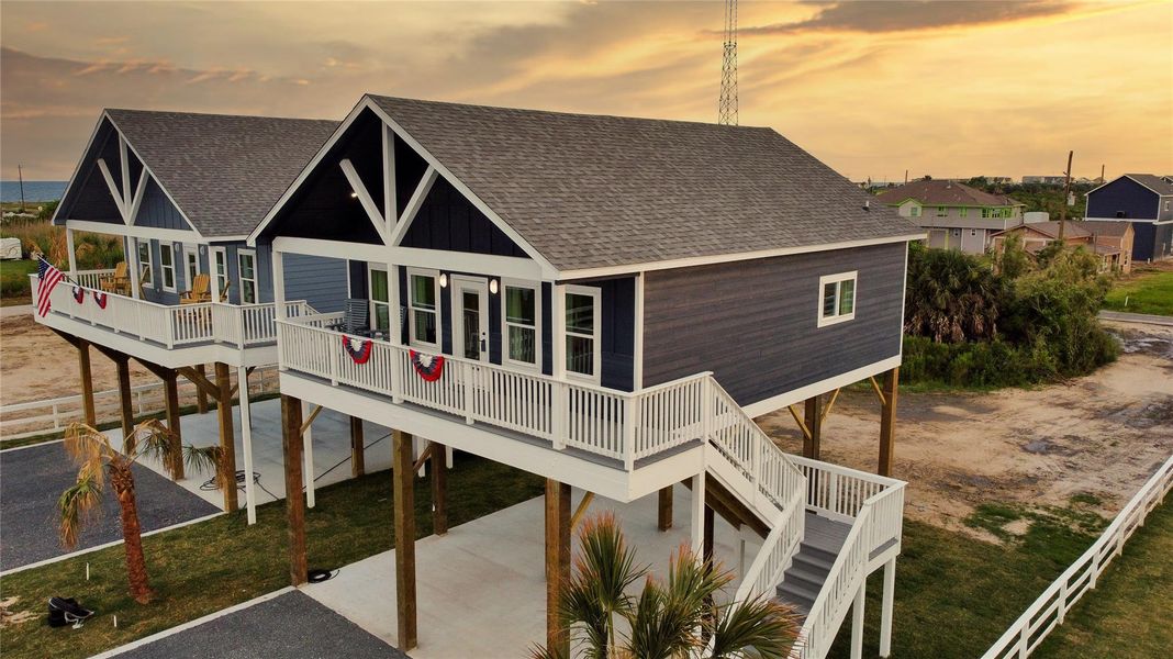 Front exterior of a new home in , Crystal Beach, TX, highlighting curb appeal (Image 28).