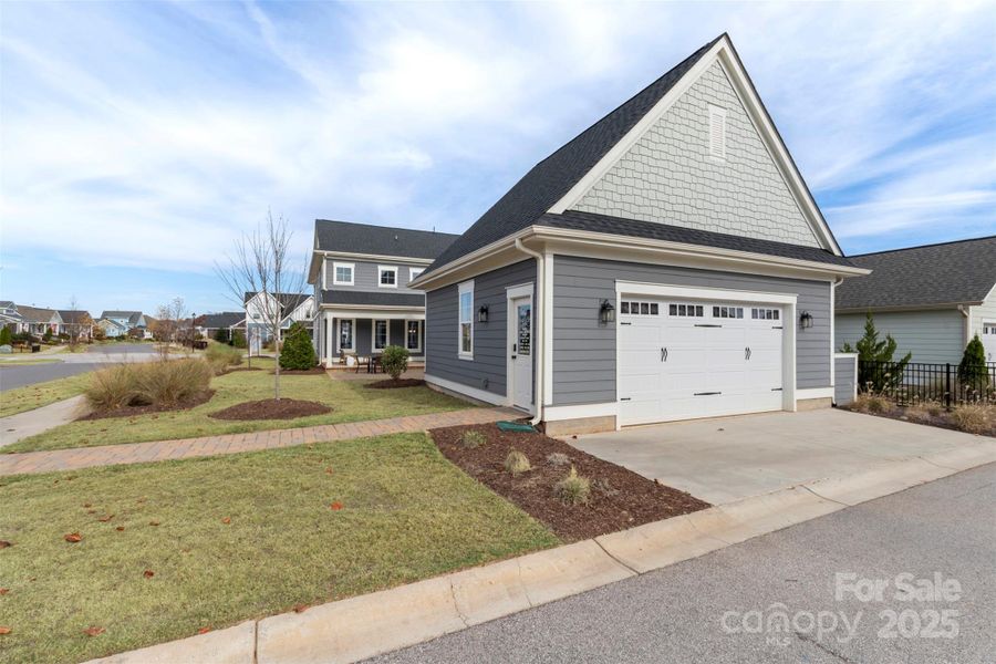 Front exterior of a new home in Riverwalk, Rock Hill, SC, highlighting curb appeal (Image 1).