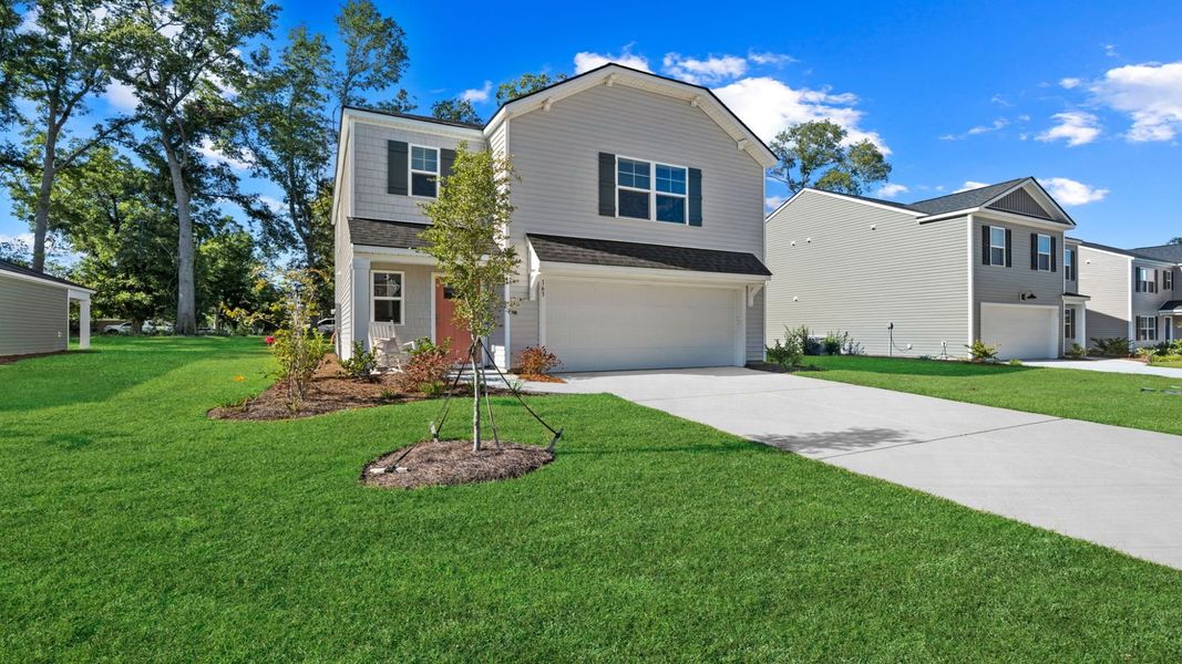 Representative exterior photo of a completed home built from the Darwin by D.R. Horton in Rice Hope, Port Wentworth, GA (Image 28). Representative exterior photo of a completed home built from the Darwin by D.R. Horton in Rice Hope, Port Wentworth, GA (Image 28).
