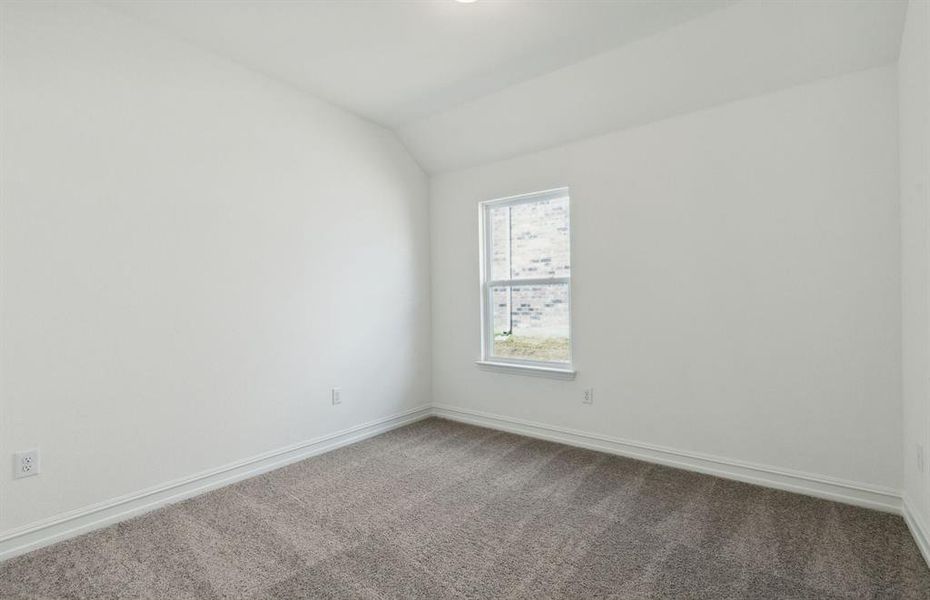 Secondary bedroom with ample closet space *real home pictured