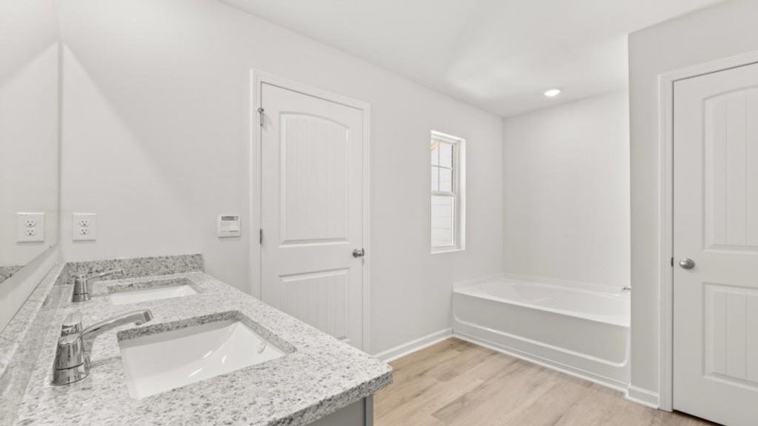 Furnished interior view inside a new home in Village at Pine Valley, Gainesville (Image 9).