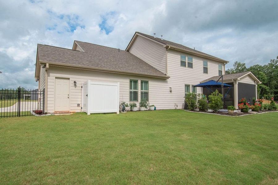 Front exterior of a new home in , Senoia, GA, highlighting curb appeal (Image 38). Front exterior of a new home in , Senoia, GA, highlighting curb appeal (Image 38).