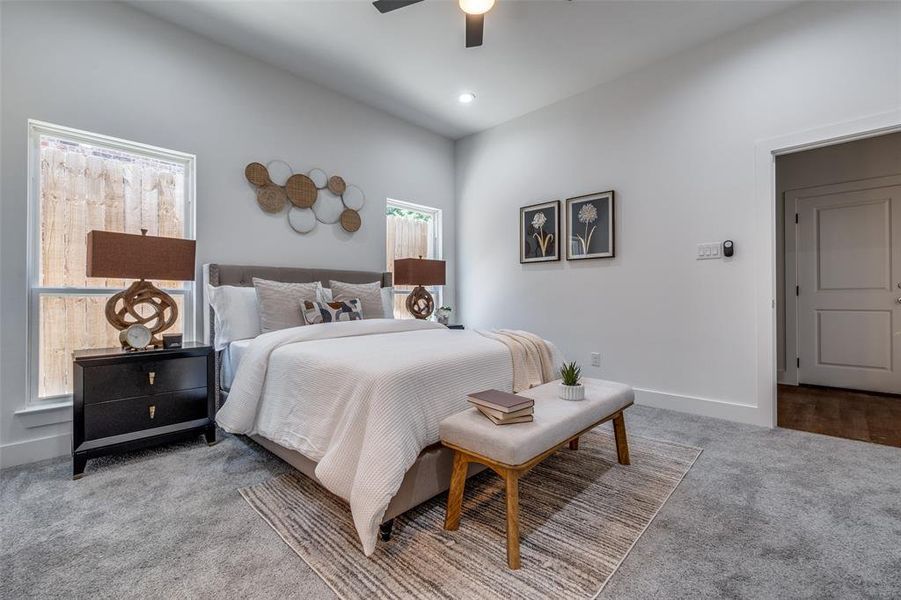 Bedroom with carpet flooring and ceiling fan