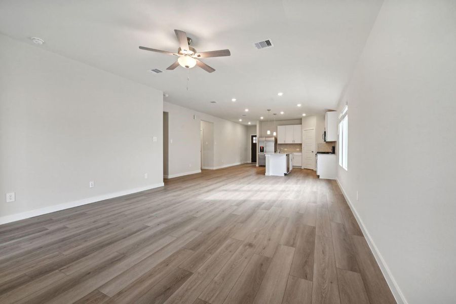 Living area is opent to the kitchen, great for casual family time or get togethers.