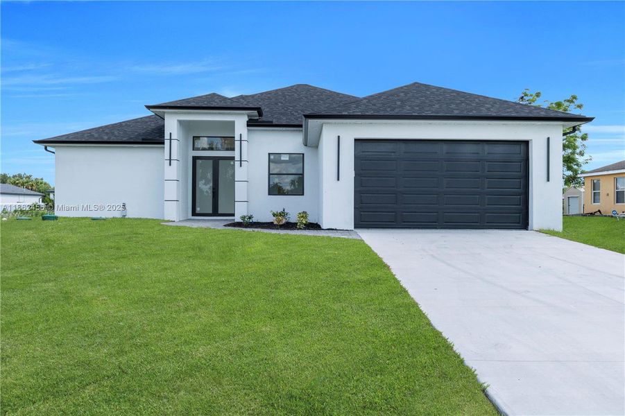 Front exterior of a new home in , Lehigh Acres, FL, highlighting curb appeal (Image 1). Front exterior of a new home in , Lehigh Acres, FL, highlighting curb appeal (Image 1).