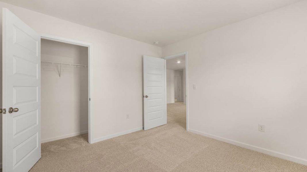 Representative unfurnished interior of a home built from the Dennis by D.R. Horton in Glenmaye, Hampton (Image 29).