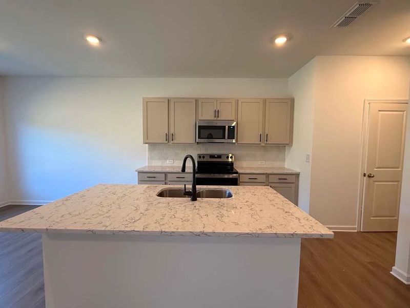 Kitchen featuring Artisan Collection Finishes