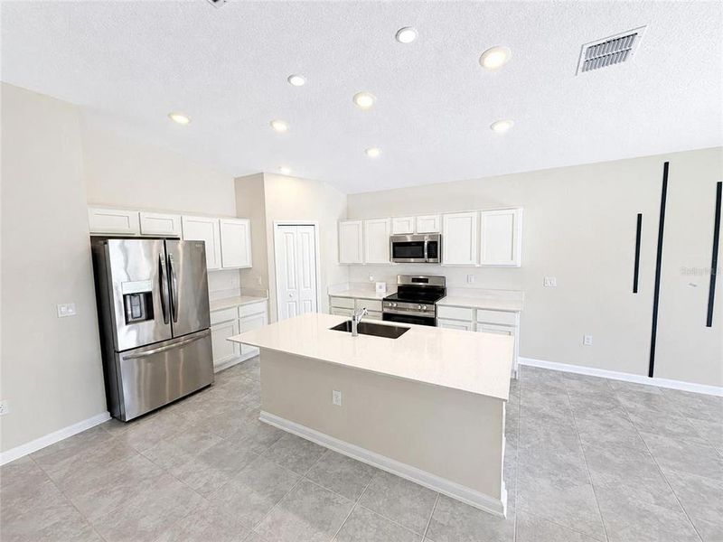 Furnished interior view inside a new home in , Kissimmee (Image 5).