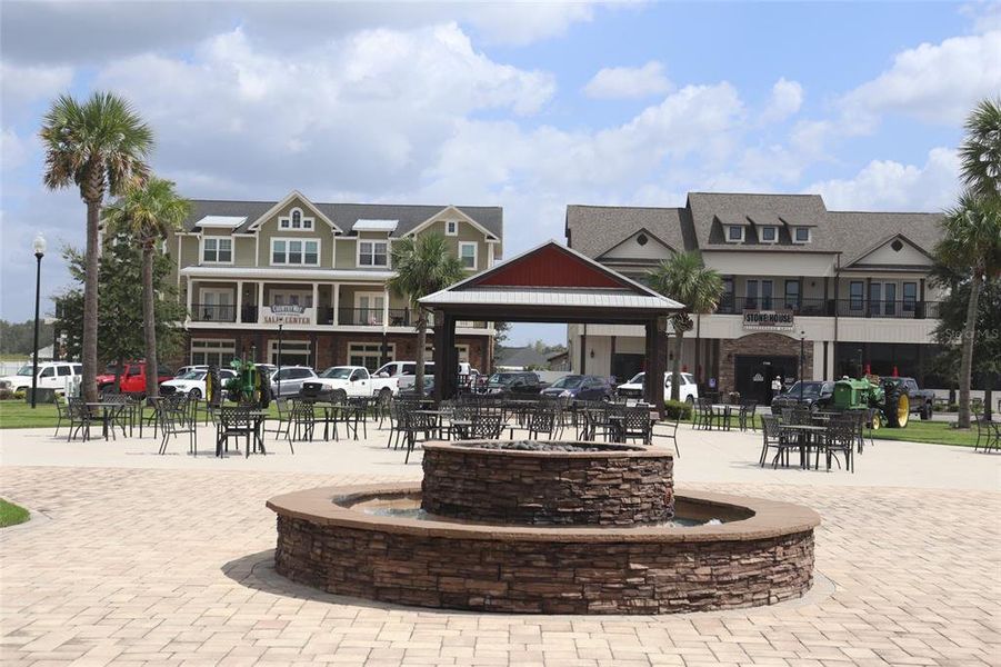 Front exterior of a new home in Countryway Town Square, Newberry, FL, highlighting curb appeal (Image 2). Front exterior of a new home in Countryway Town Square, Newberry, FL, highlighting curb appeal (Image 2).