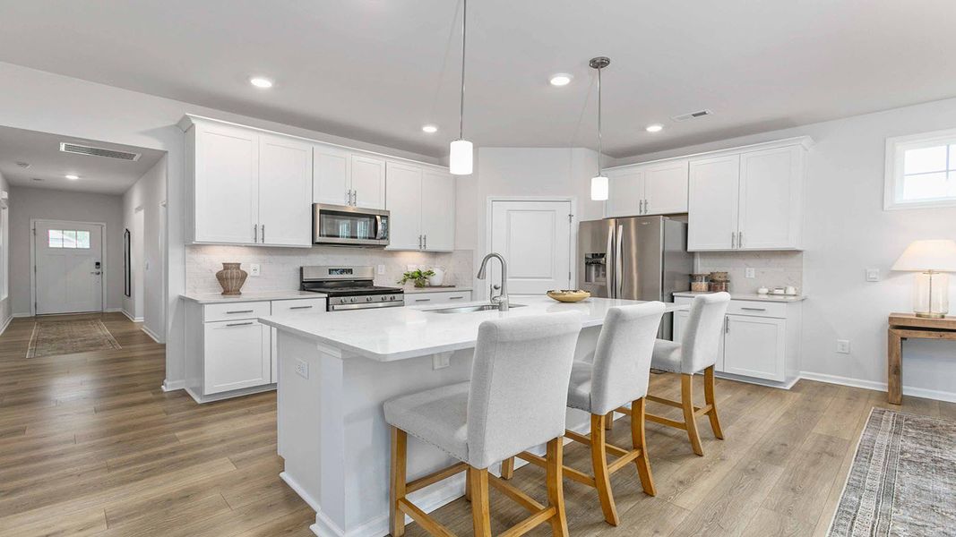 Furnished interior view inside a new home in The Villas at Kinsley, Jamestown (Image 12).