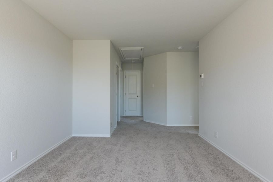 Representative unfurnished interior of a home built from the Cassidy by Ashton Woods in Cordova Trails, Seguin (Image 20).