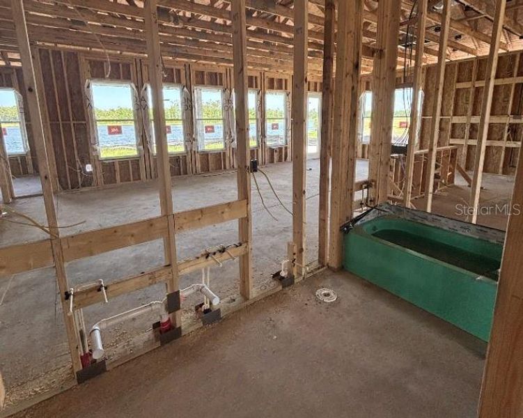 In-progress construction of a new home in Ardisia Park Estate, New Smyrna Beach, FL (Image 19).