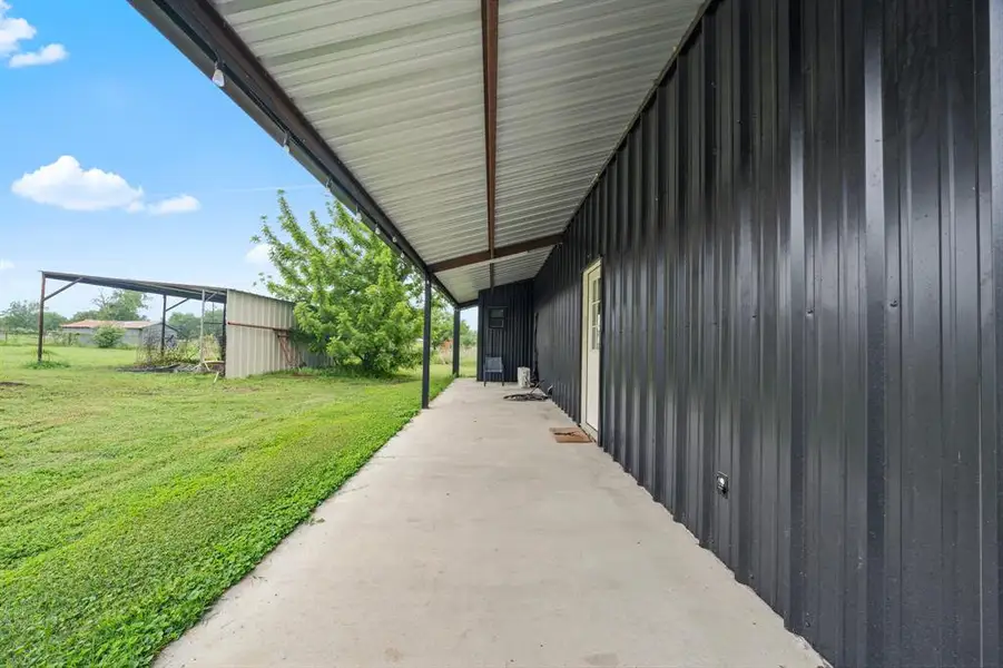 Exterior details and patio area of a home in , Walnut Springs (Image 16).