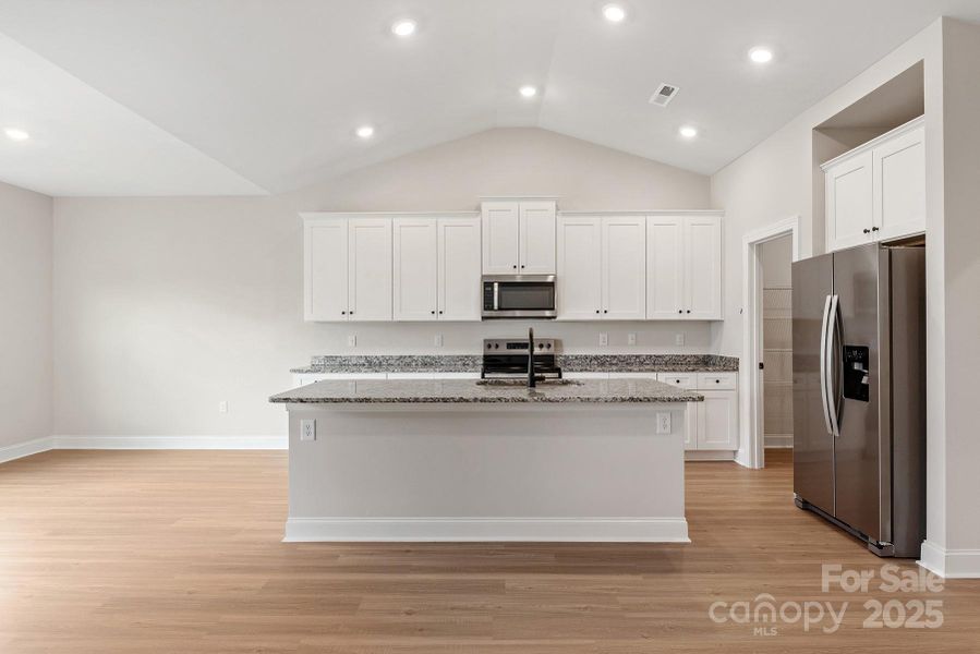 Furnished interior view inside a new home in Stagecoach Station, Gastonia (Image 5).