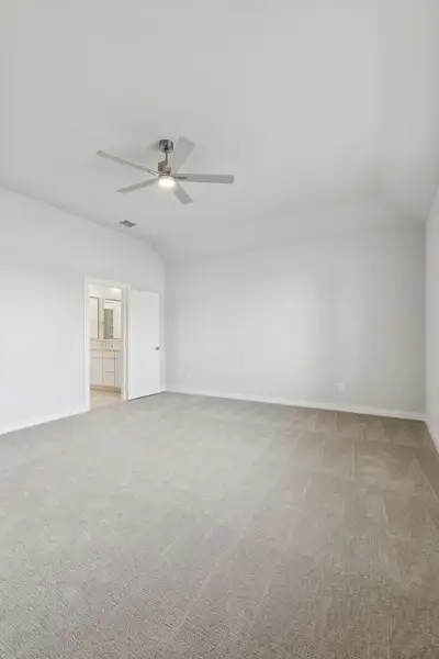 Primary Suite in the Stanley II home plan by Trophy Signature Homes – REPRESENTATIVE PHOTO
