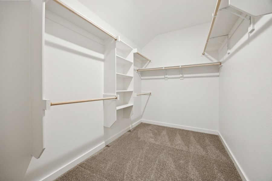 Primary Closet in the Oscar home plan by Trophy Signature Homes – REPRESENTATIVE PHOTO Primary Closet in the Oscar home plan by Trophy Signature Homes – REPRESENTATIVE PHOTO
