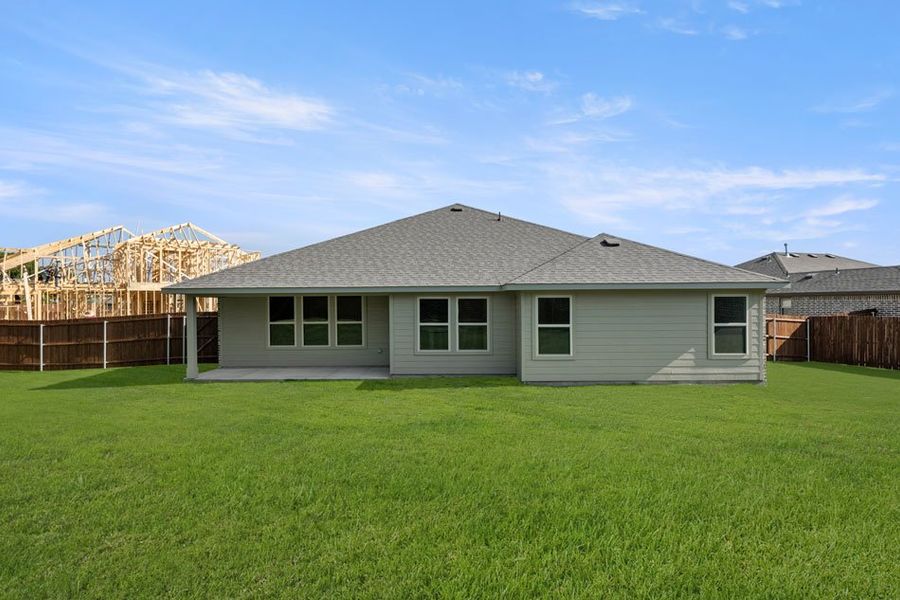 Front exterior of a new home in Stone Eagle, Azle, TX, highlighting curb appeal (Image 13). Front exterior of a new home in Stone Eagle, Azle, TX, highlighting curb appeal (Image 13).