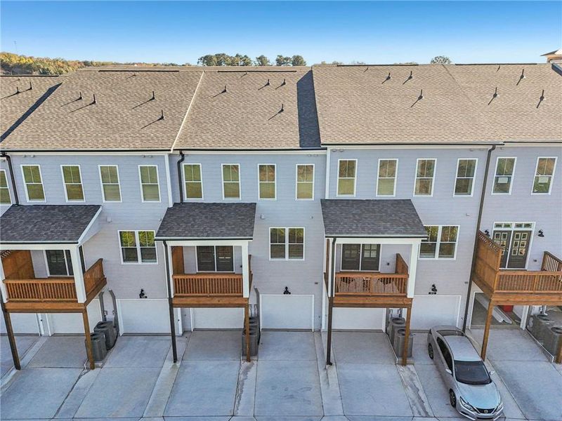 Exterior details and patio area of a home in Market Square at Sawnee Village, Cumming (Image 24).