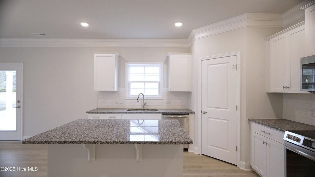 Furnished interior view inside a new home in Palmetto Creek, Bolivia (Image 6).