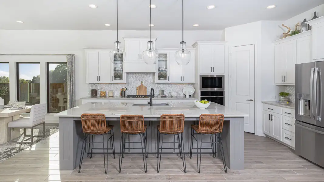 Representative furnished interior of a home built from the 2885W by Perry Homes in Walden Creek, Montgomery (Image 7).