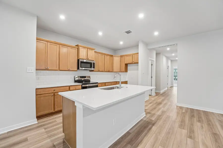 Furnished interior view inside a new home in Hills of Westwood, Temple (Image 4).