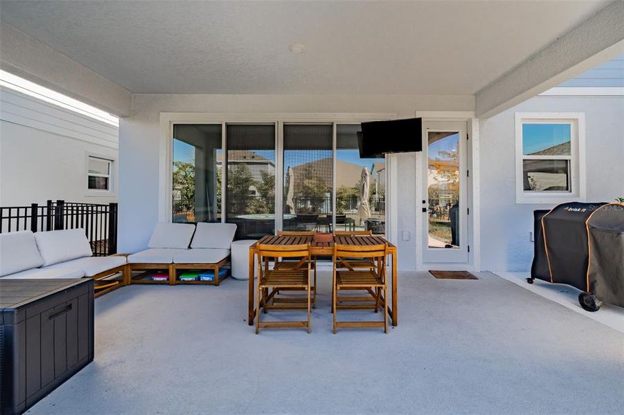 Exterior details and patio area of a home in Waterset Garden Series, Apollo Beach (Image 4).