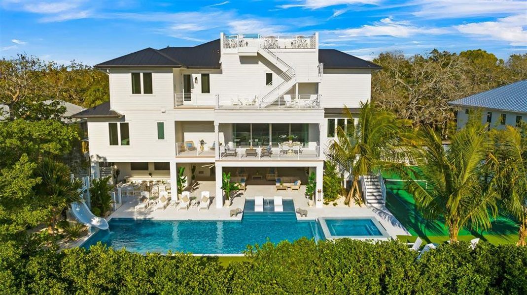 Front exterior of a new home in , Sarasota, FL, highlighting curb appeal (Image 1). Front exterior of a new home in , Sarasota, FL, highlighting curb appeal (Image 1).