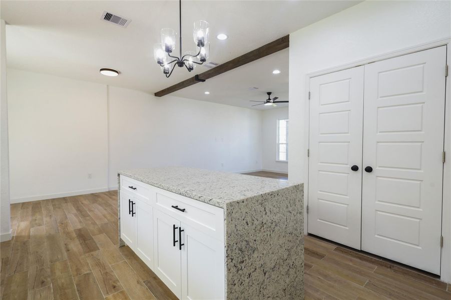 Furnished interior view inside a new home in , Conroe (Image 3).