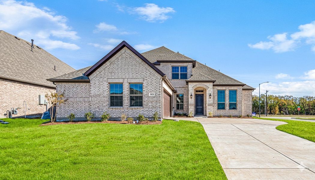 Front exterior of a new home in Forest Ridge Estates, Greenville, TX, highlighting curb appeal (Image 1). Front exterior of a new home in Forest Ridge Estates, Greenville, TX, highlighting curb appeal (Image 1).