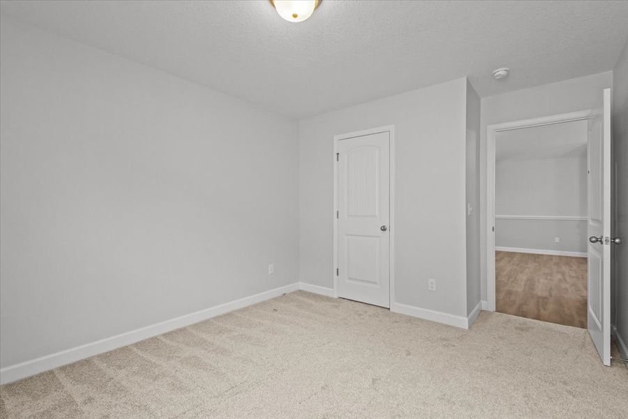 Representative unfurnished interior of a home built from the Ellison by Enchanted Homes in Hampshire Heights, Moore (Image 36).