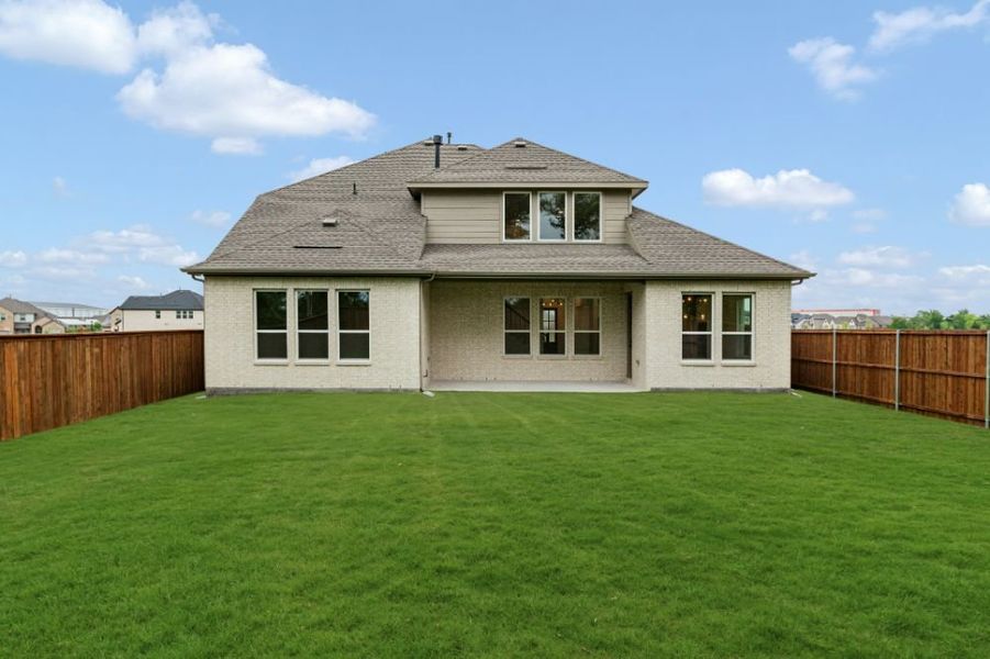 Exterior details and patio area of a home in Milrany Ranch, Melissa (Image 3).