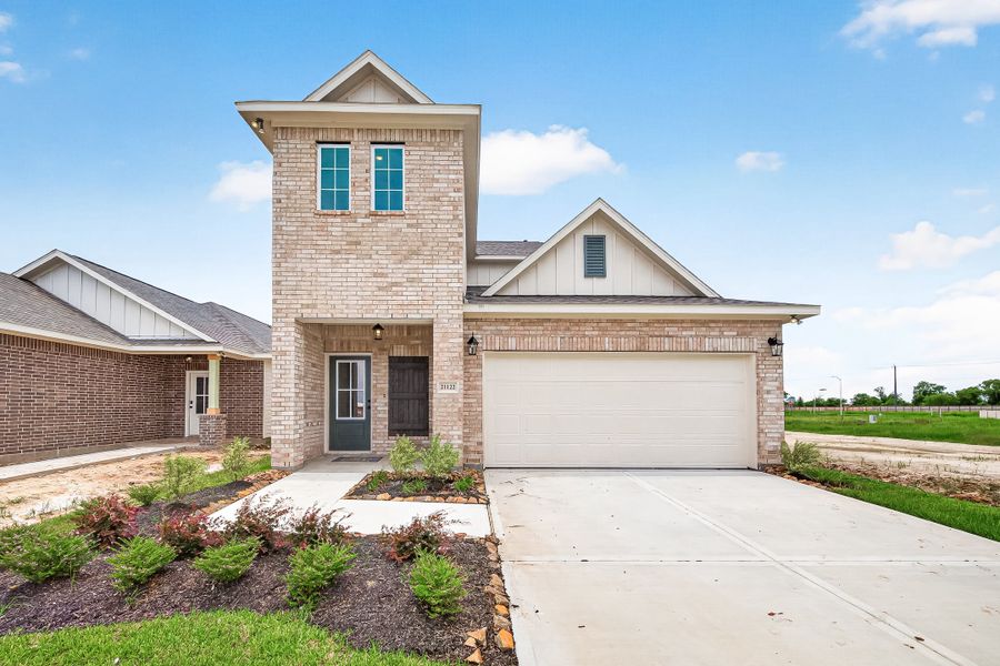 Front exterior of a new home in Aldeana, Bonney, TX, highlighting curb appeal (Image 22).