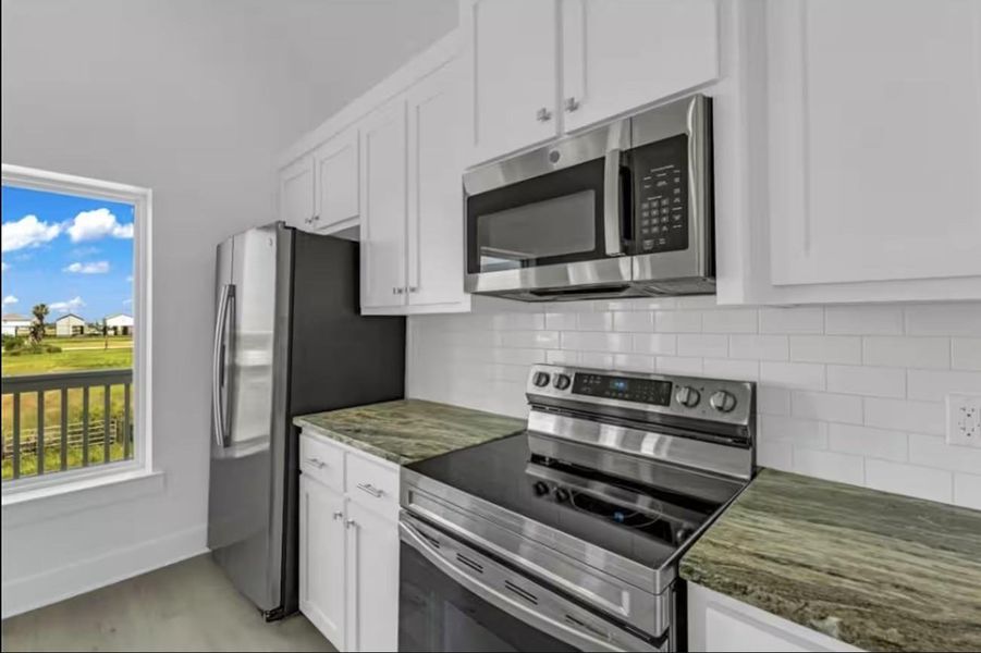 Furnished interior view inside a new home in , Crystal Beach (Image 7).