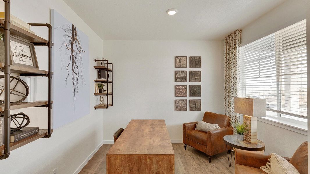 Representative furnished interior of a home built from the Holcombe by D.R. Horton in Settlers Crossing, Commerce City (Image 5).